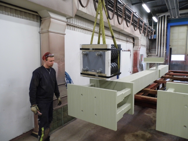 Spring mount lowered into column