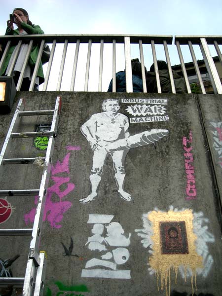 Banksy's Cans Festival - Bush stencil and Eat Politicians