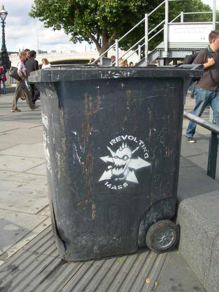 Hitler Suicide & Revolting Mass Stencils on Wheelie Bin, Embankment, London, UK Hitler Suicide & Revolting Mass Stencils on Wheelie Bin, Embankment, London, UK