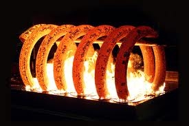 Hot-wound spring being quenched