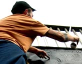 Revolting Mass - Hard at Work at Banksy's: Can's Street Art Festival