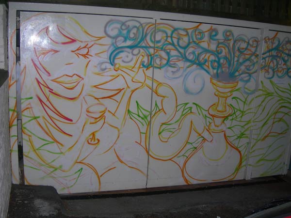 Graffiti of Woman Smoking Shisha Pipe on Pub Gates