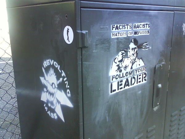 Revolting Mass logo & anti-fascist Follow Your Leader street art