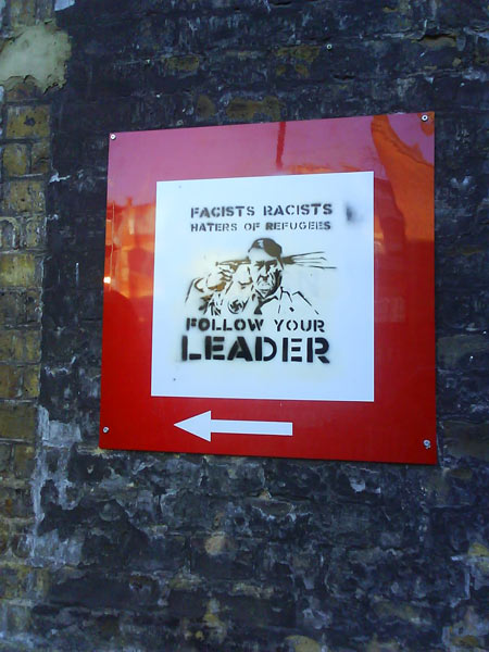 Revolting Mass thoughtfully stenciled a handy sign for lost fascists