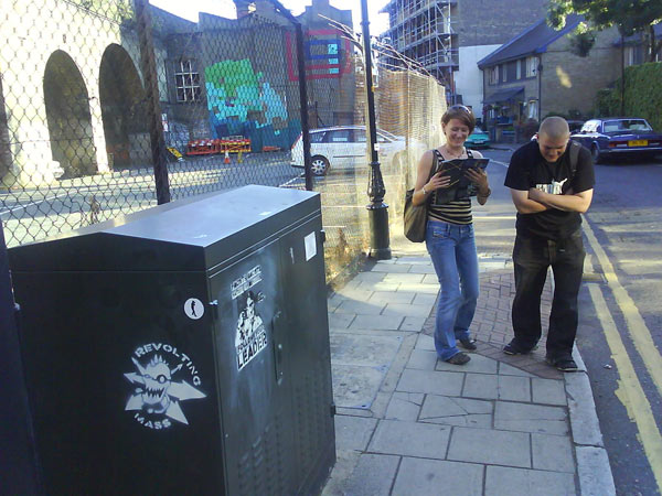 Official Tate Modern Graffiti in the background. Forground electrical box hi-jacked by Revolting Mass